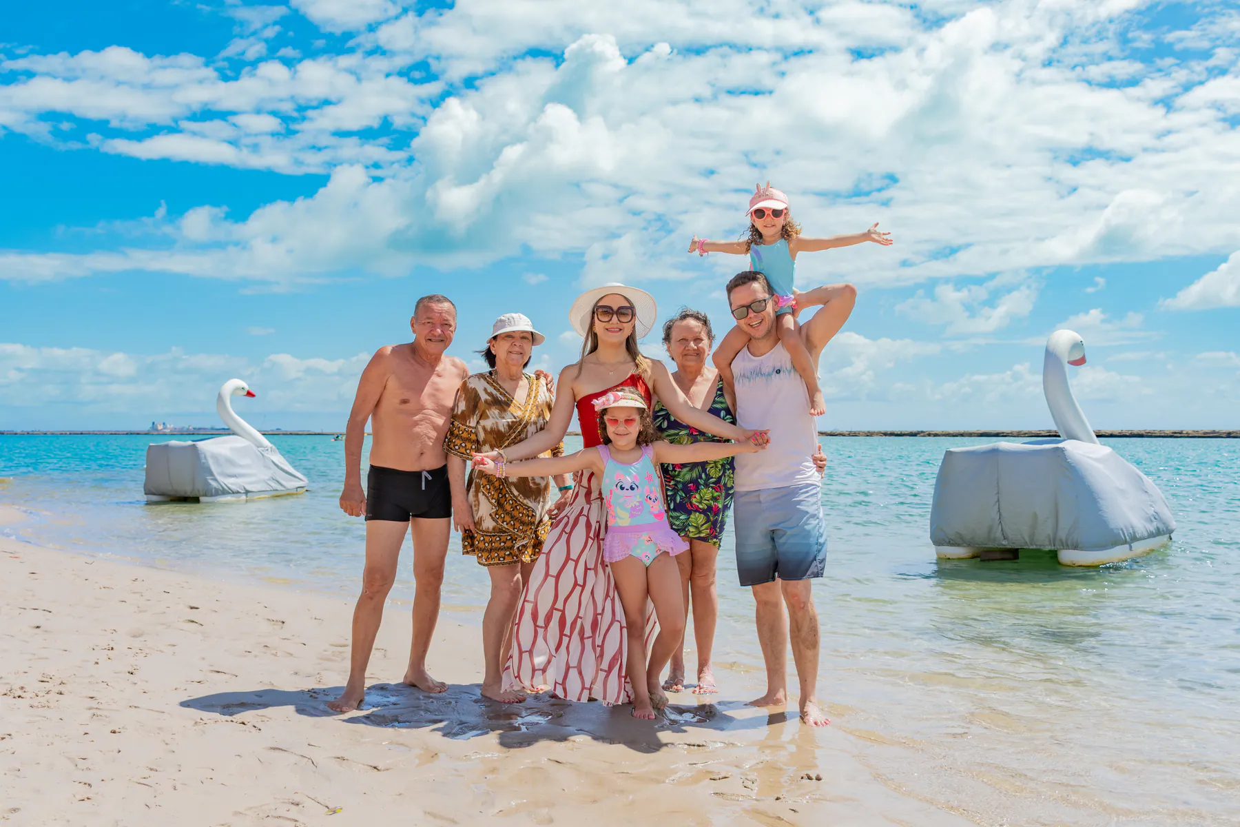 Família em ensaio na praia